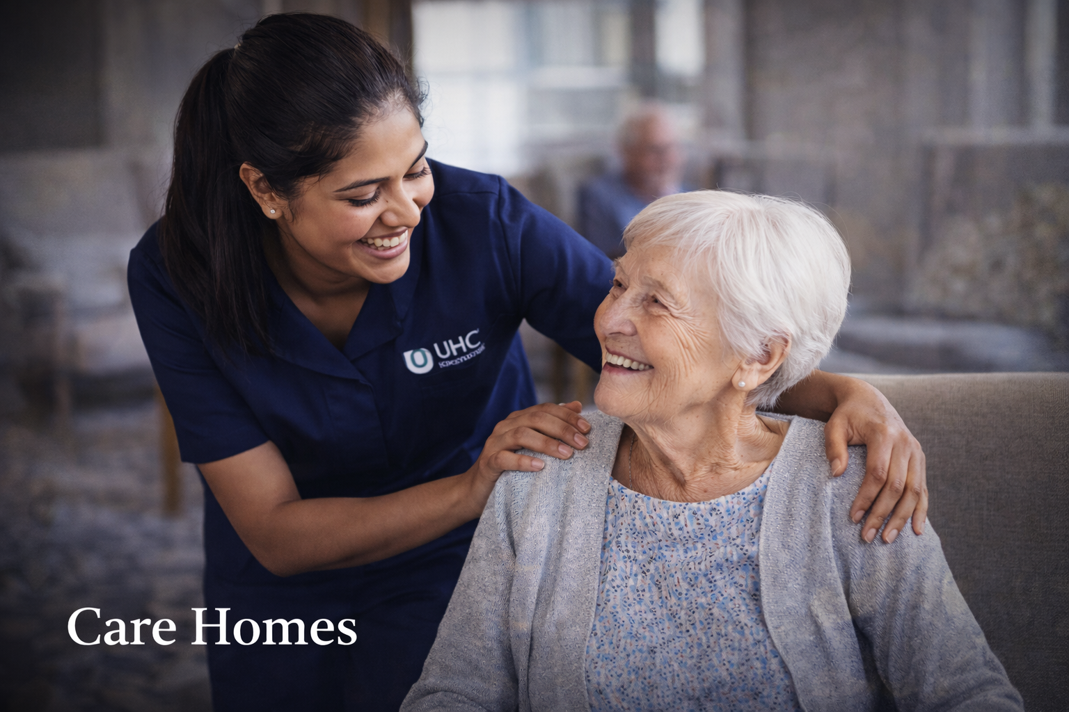 Care staff supporting an older person in a care home setting